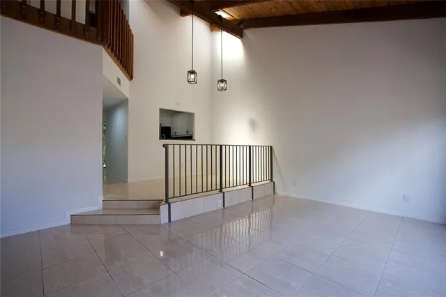 a view of a hallway with entryway