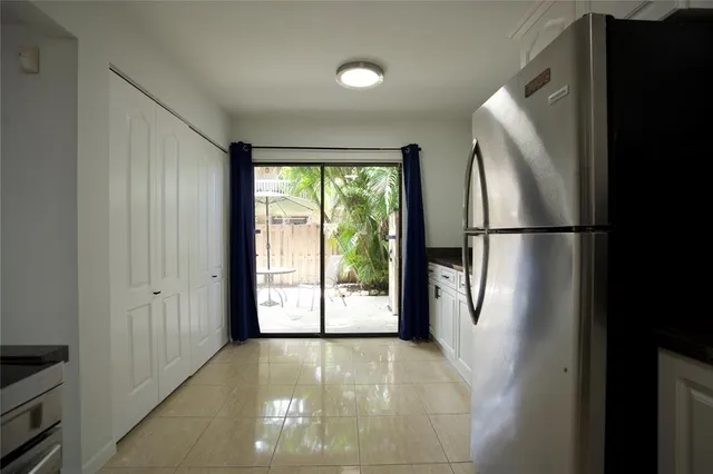 a view of a hallway with entryway