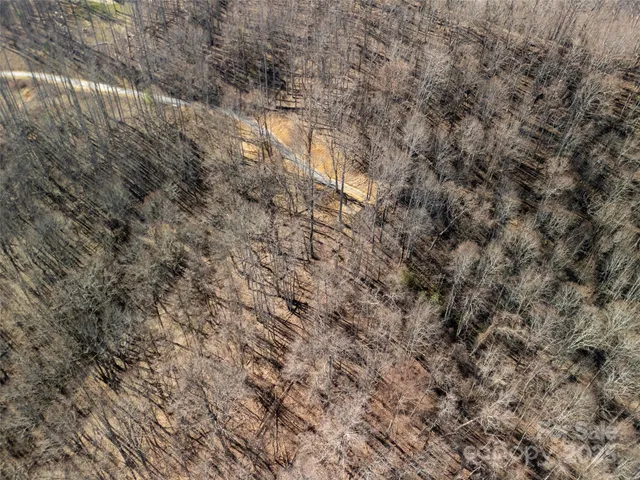 a view of a backyard of the house