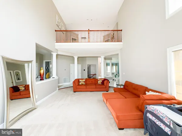 a living room with furniture and window