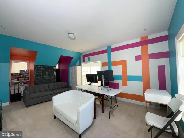 a living room with furniture and a couch