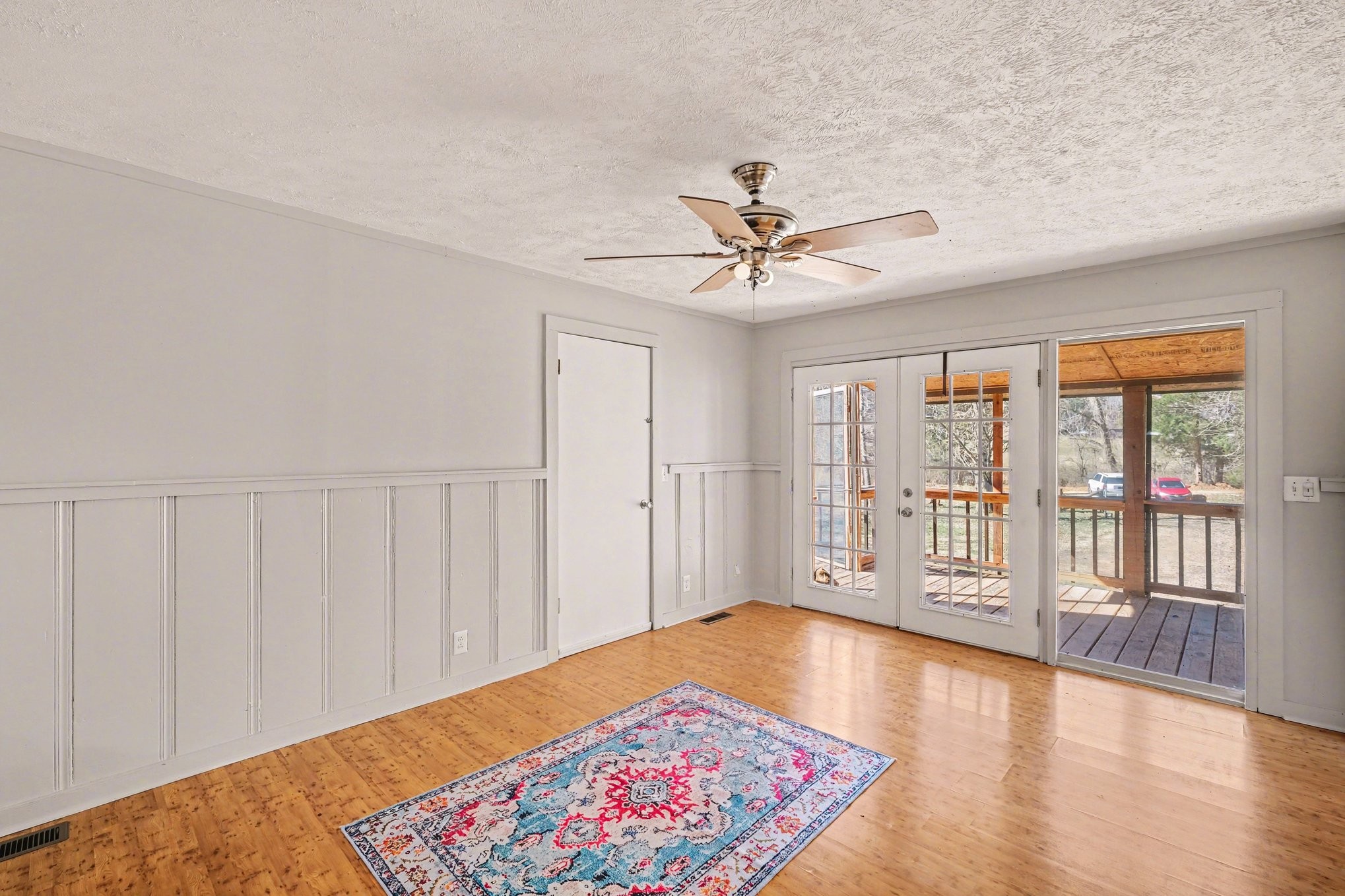 2650 Pretty Creek Road Nunnelly, TN 37137 - Photo 15 of 30 a view of an empty room with a window and wooden floor