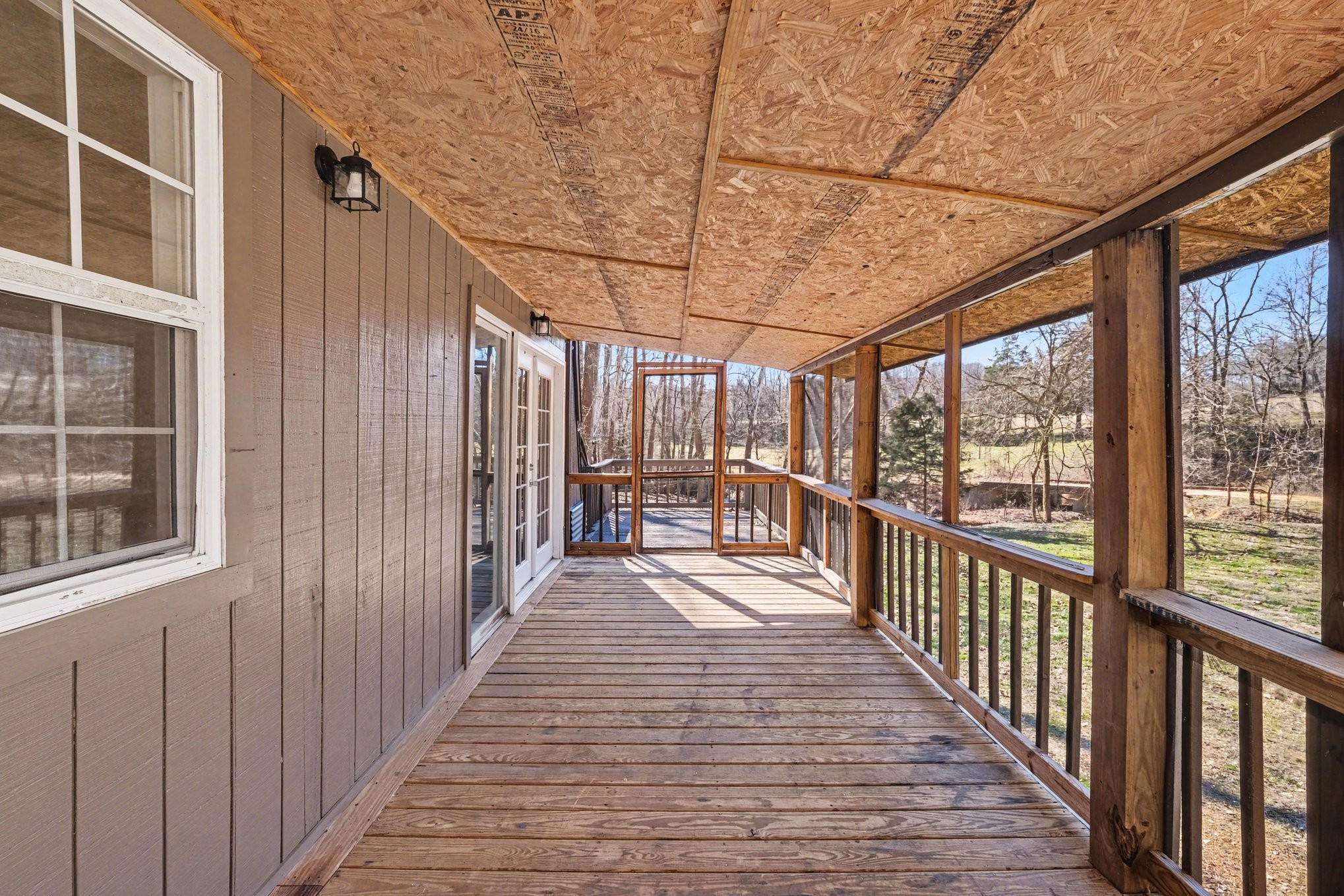 2650 Pretty Creek Road Nunnelly, TN 37137 - Photo 27 of 30 a view of a porch with wooden floor and outdoor space