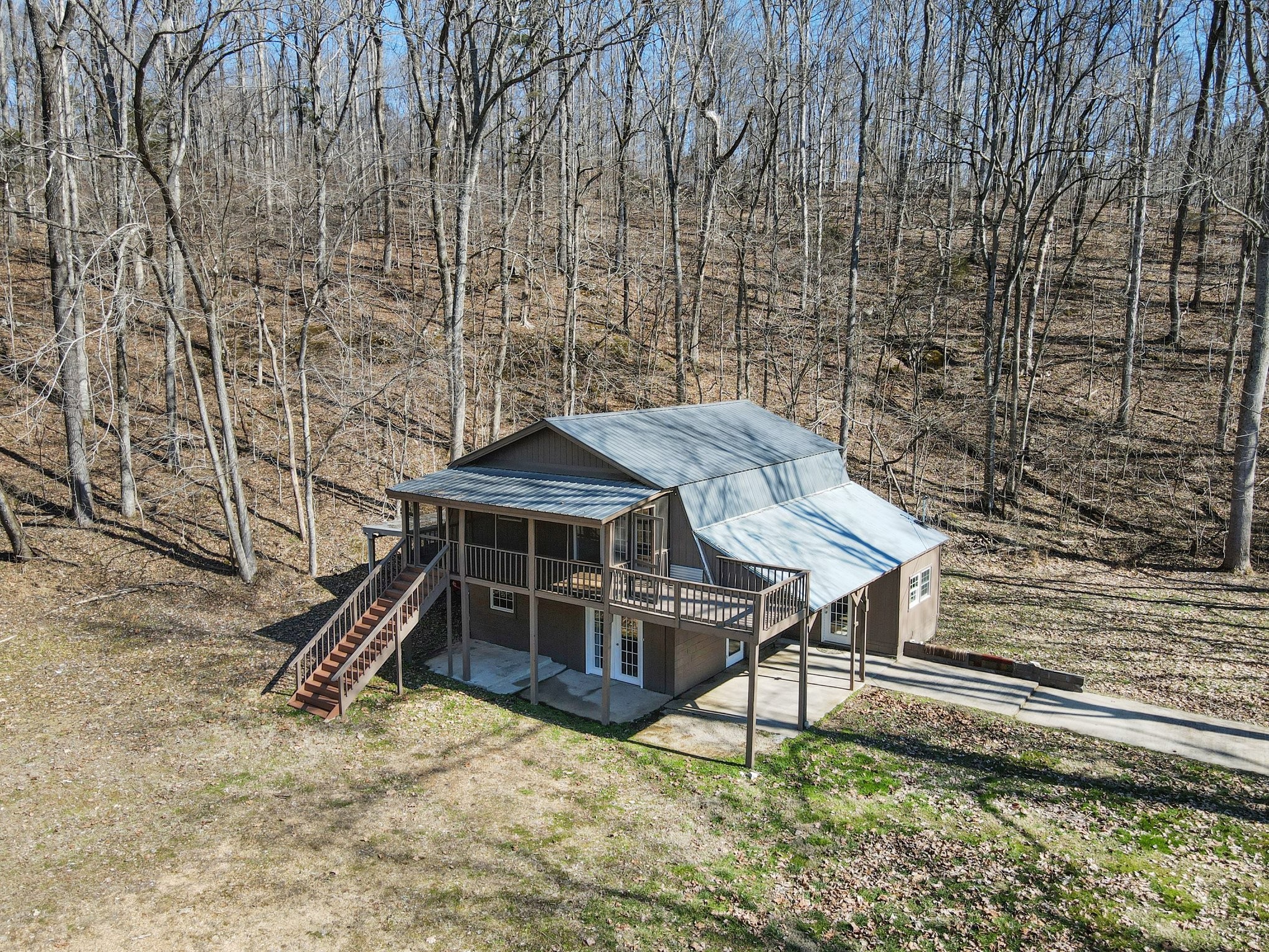 2650 Pretty Creek Road Nunnelly, TN 37137 - Photo 5 of 30 a wooden bench sitting in the middle of a yard