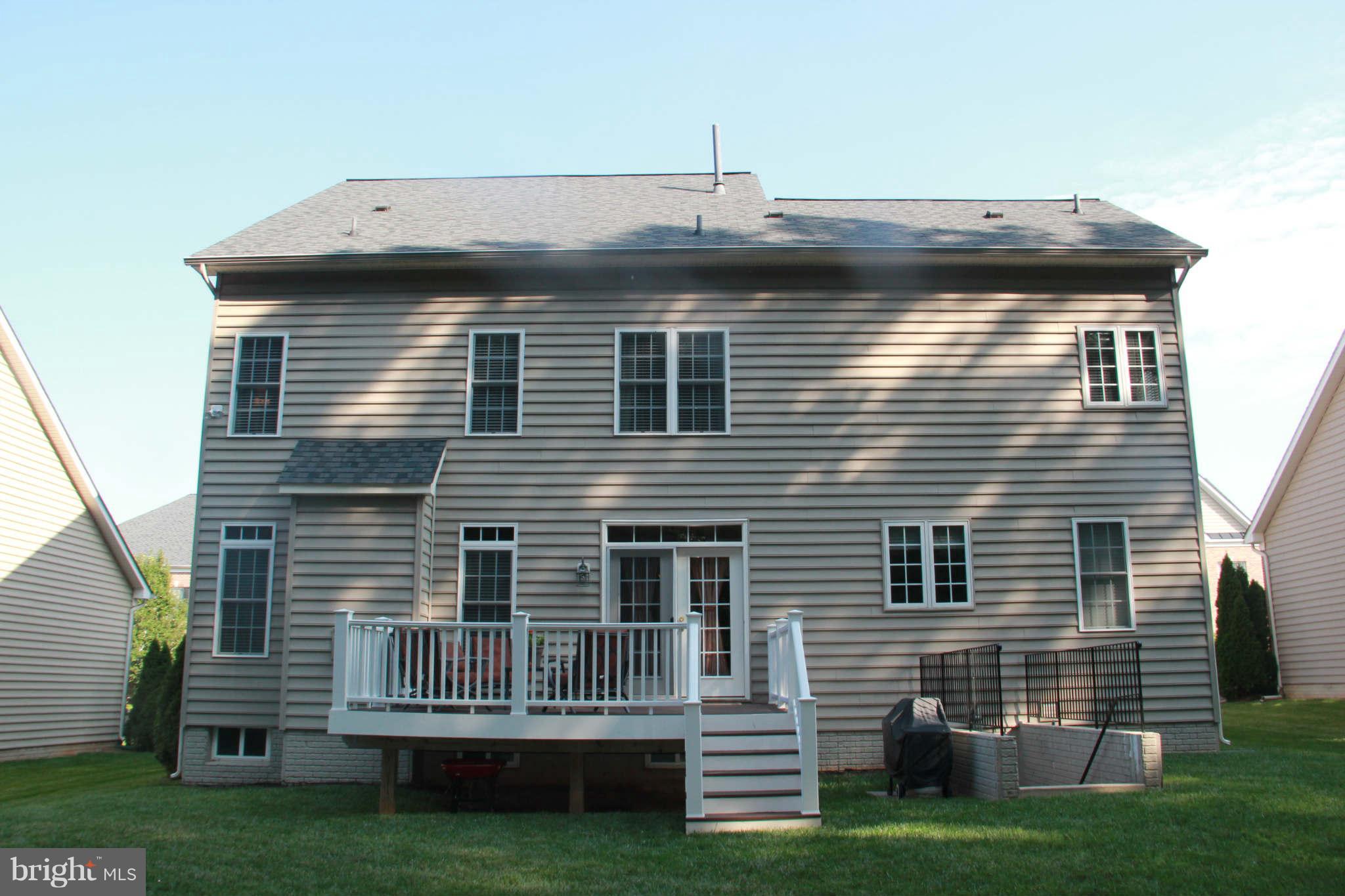 10809 Catron Road Perry Hall, MD 21128 - Photo 2 of 30 a front view of a house with a garden
