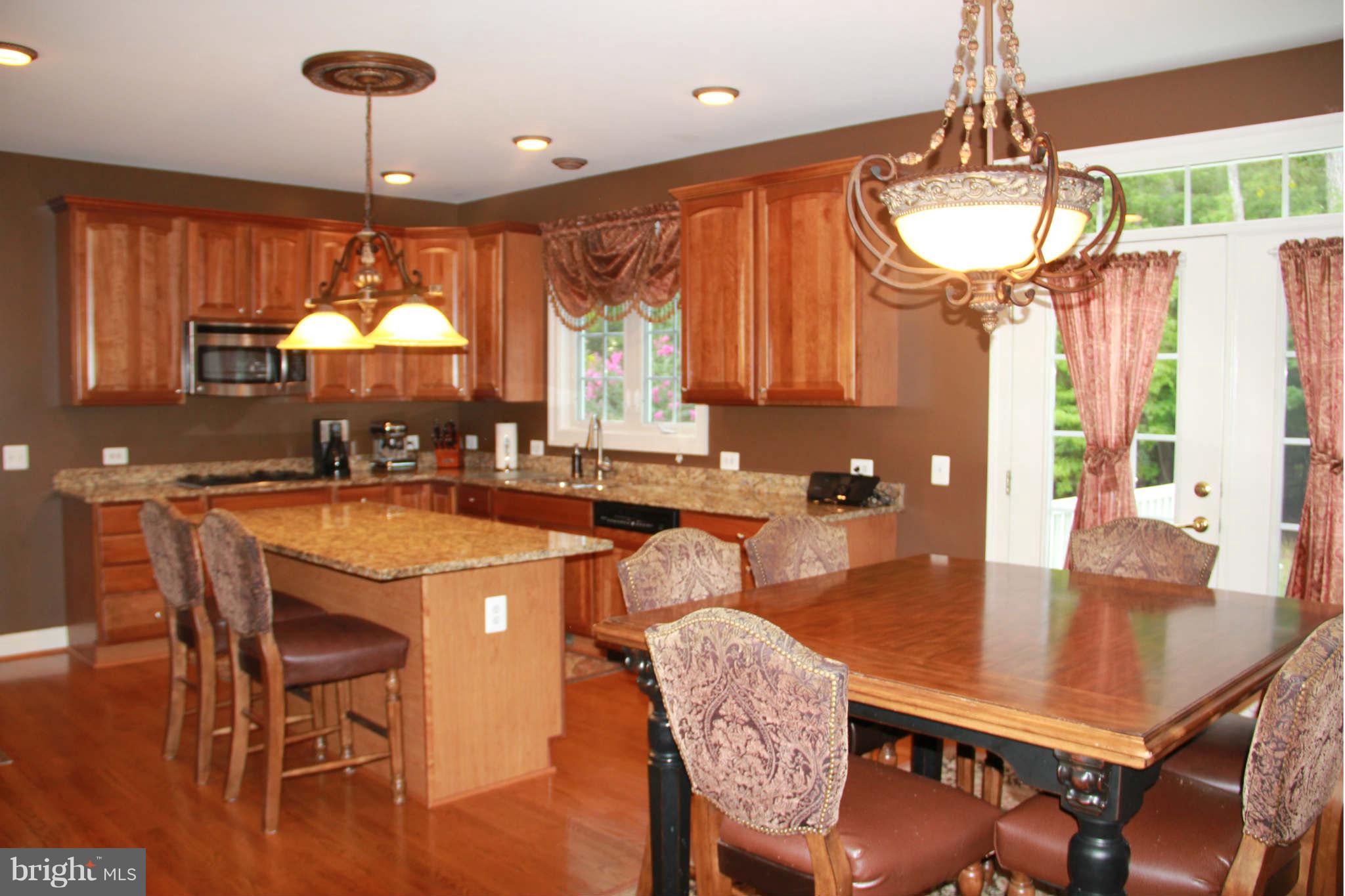 10809 Catron Road Perry Hall, MD 21128 - Photo 13 of 30 a dining table with chairs and window