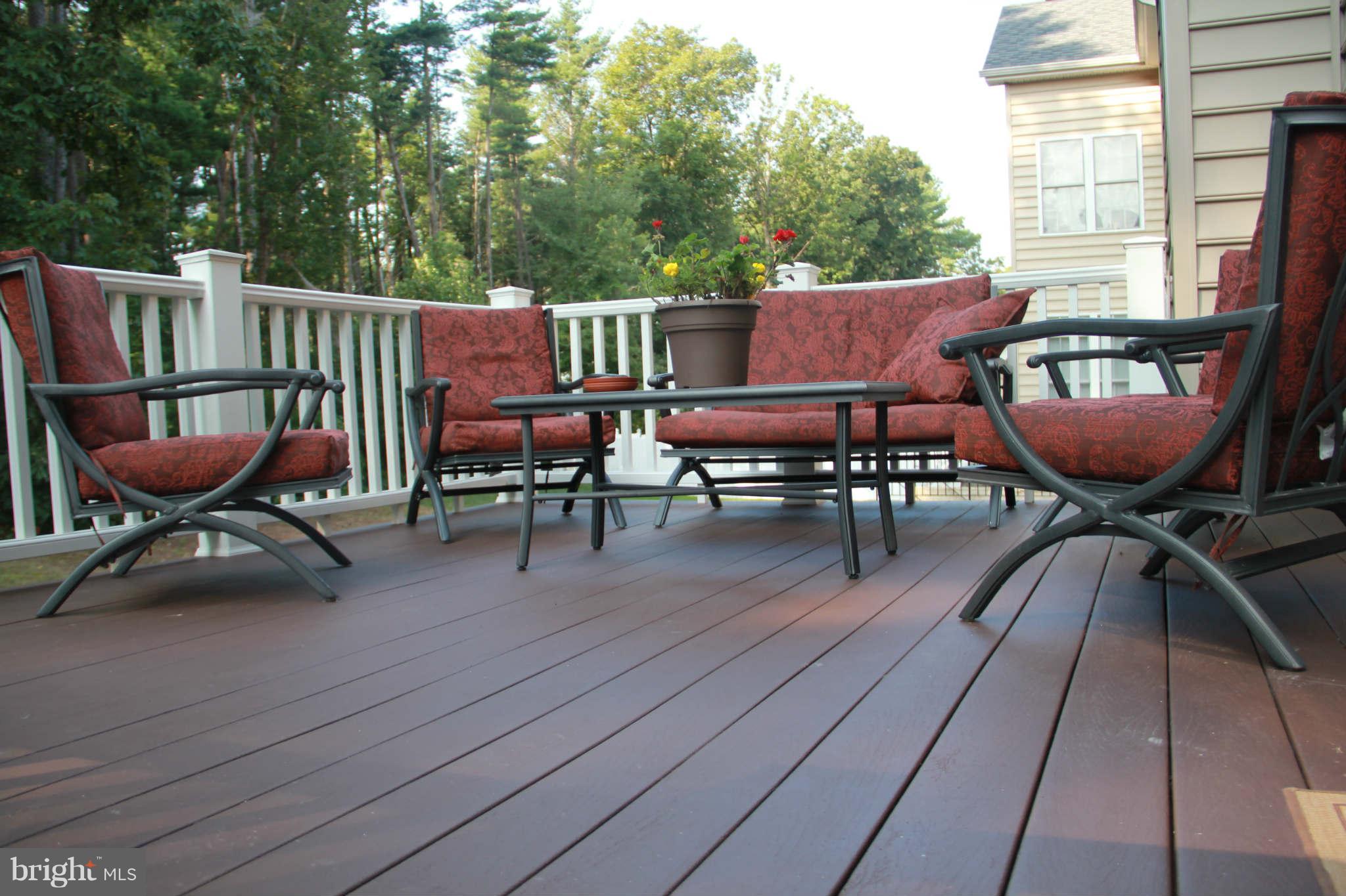 10809 Catron Road Perry Hall, MD 21128 - Photo 3 of 30 a view of a patio with table and chairs
