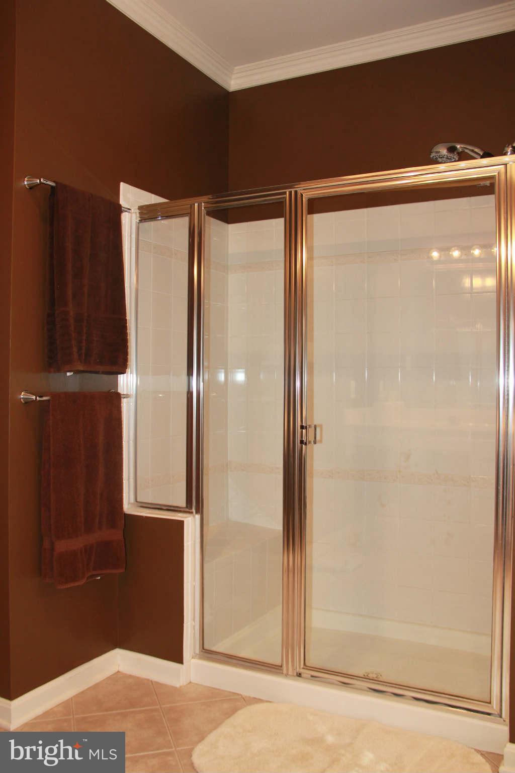 10809 Catron Road Perry Hall, MD 21128 - Photo 22 of 30 a bathroom with a glass shower door