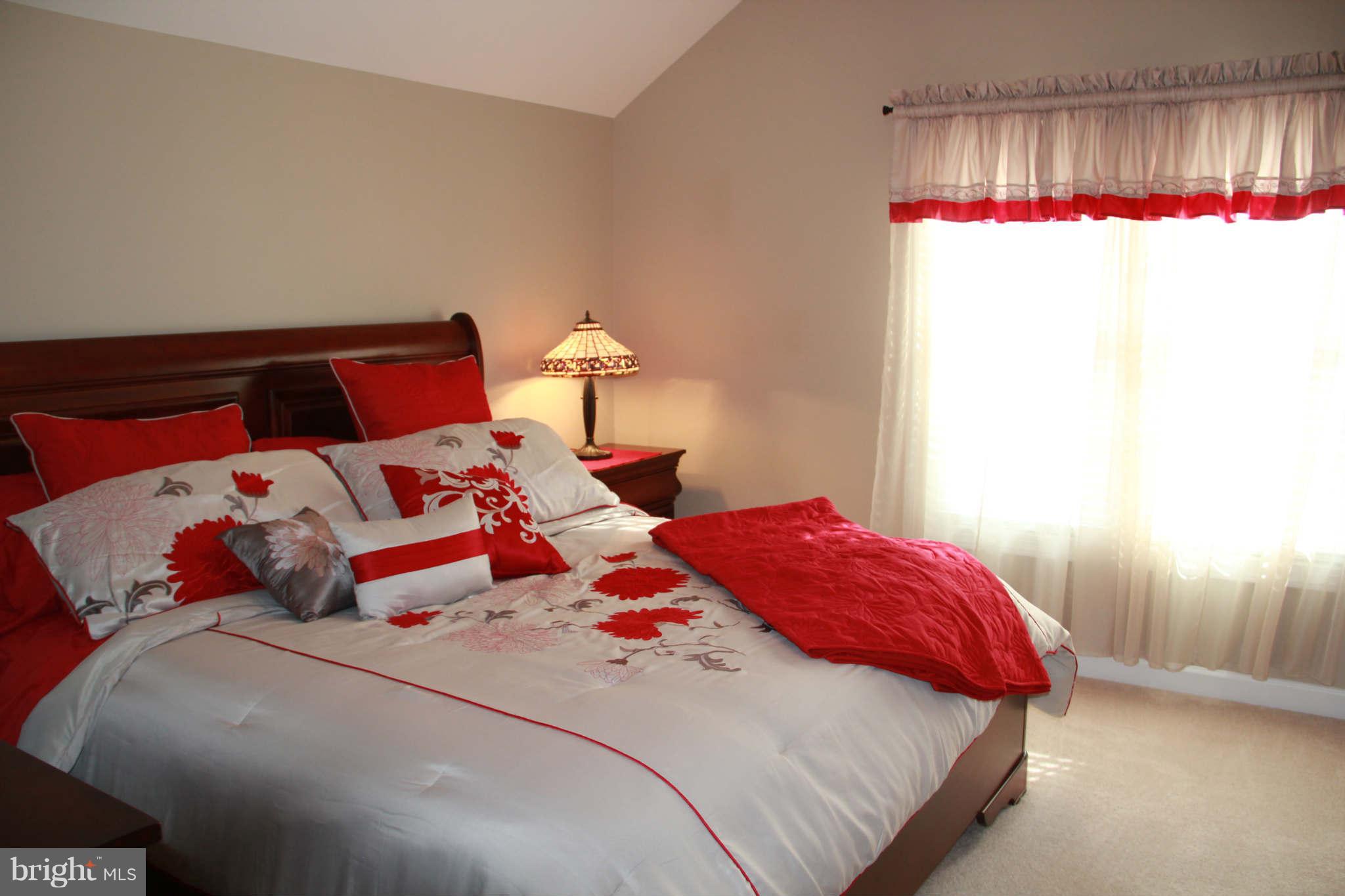 10809 Catron Road Perry Hall, MD 21128 - Photo 25 of 30 a bedroom with bed and a window