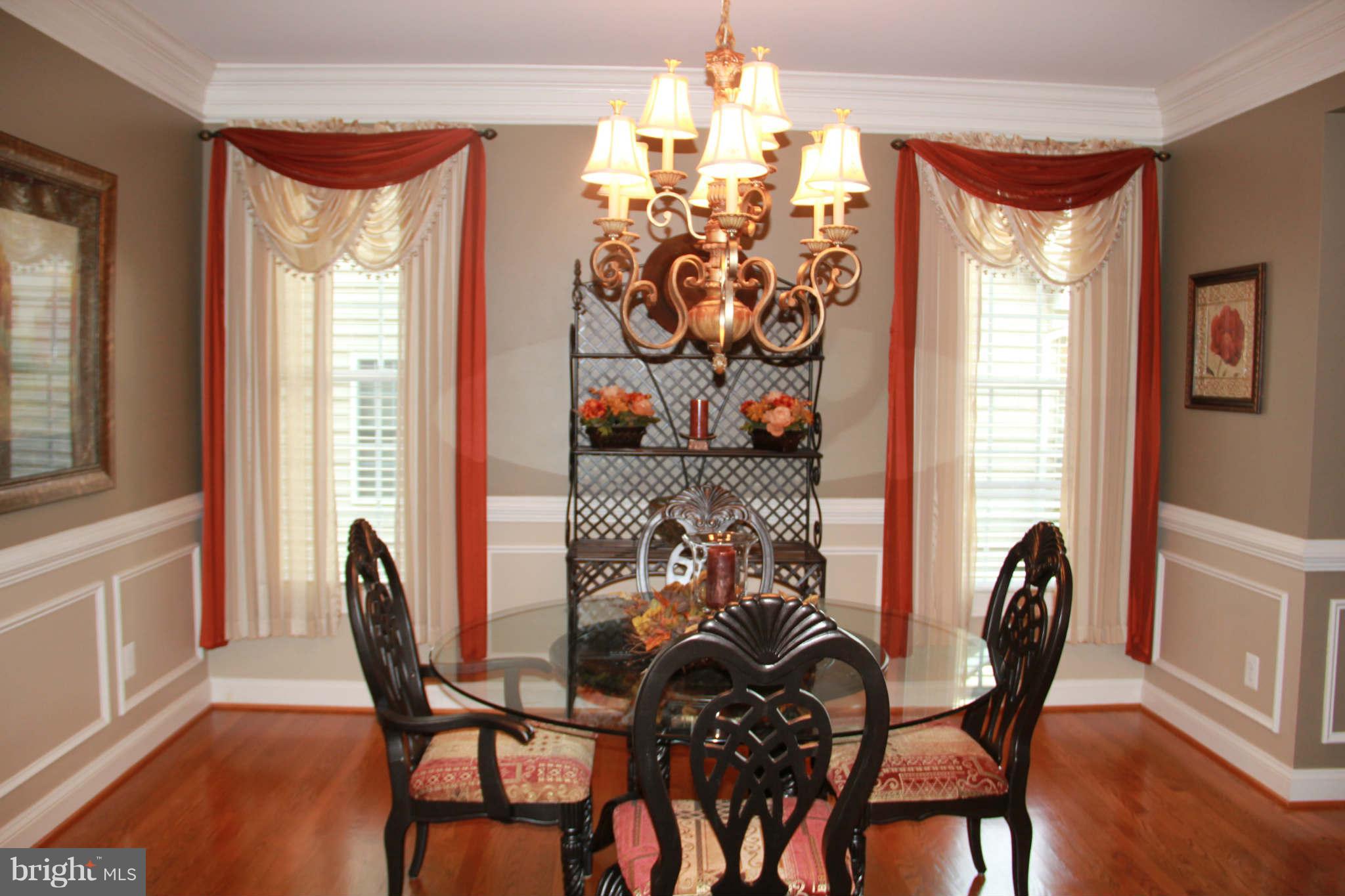10809 Catron Road Perry Hall, MD 21128 - Photo 9 of 30 a view of a dining room with furniture and a window