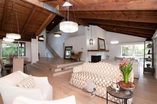 a view of a two chairs in the balcony