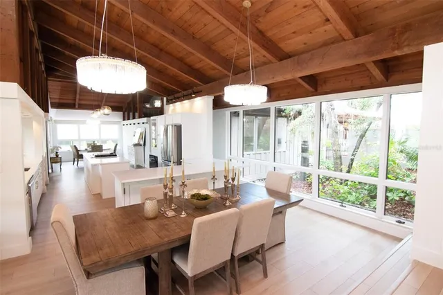 a view of a balcony with wooden fence and floor