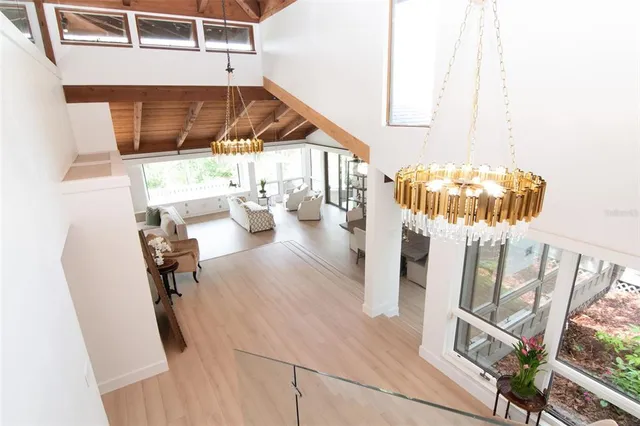 a room with furniture and air hockey table