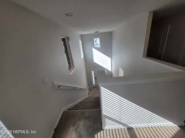 an empty room with windows