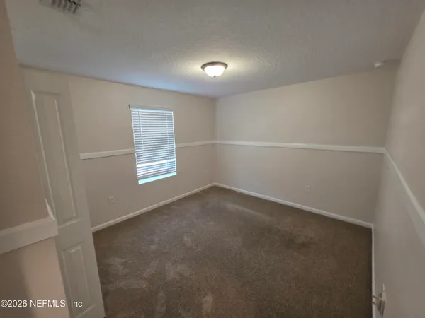 an empty room with closet