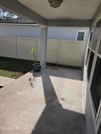 a view of a lake with a yard
