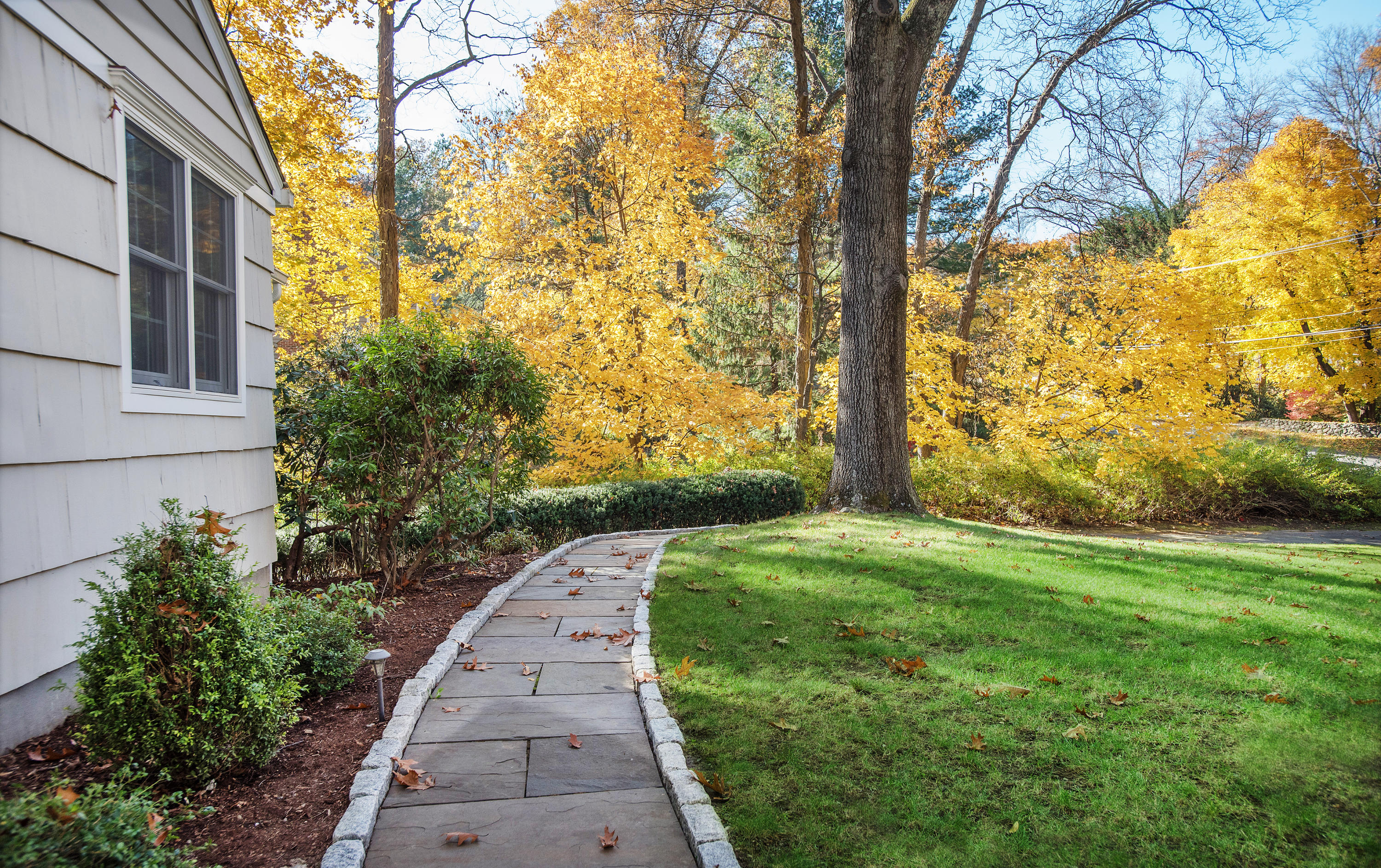 32 Putnam Road New Canaan, CT 06840 - Photo 2 of 25 Belgium block sidewalk to front door