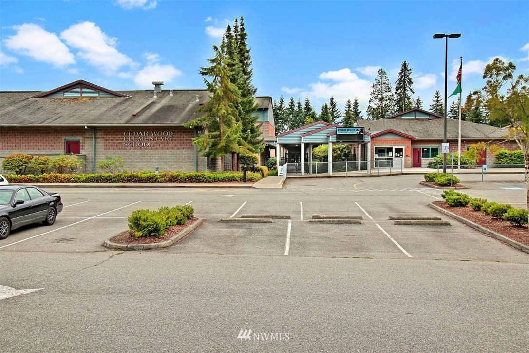 3221 172 Street Southeast Bothell, WA 98012 - Photo 23 of 23 front view of a house with a yard