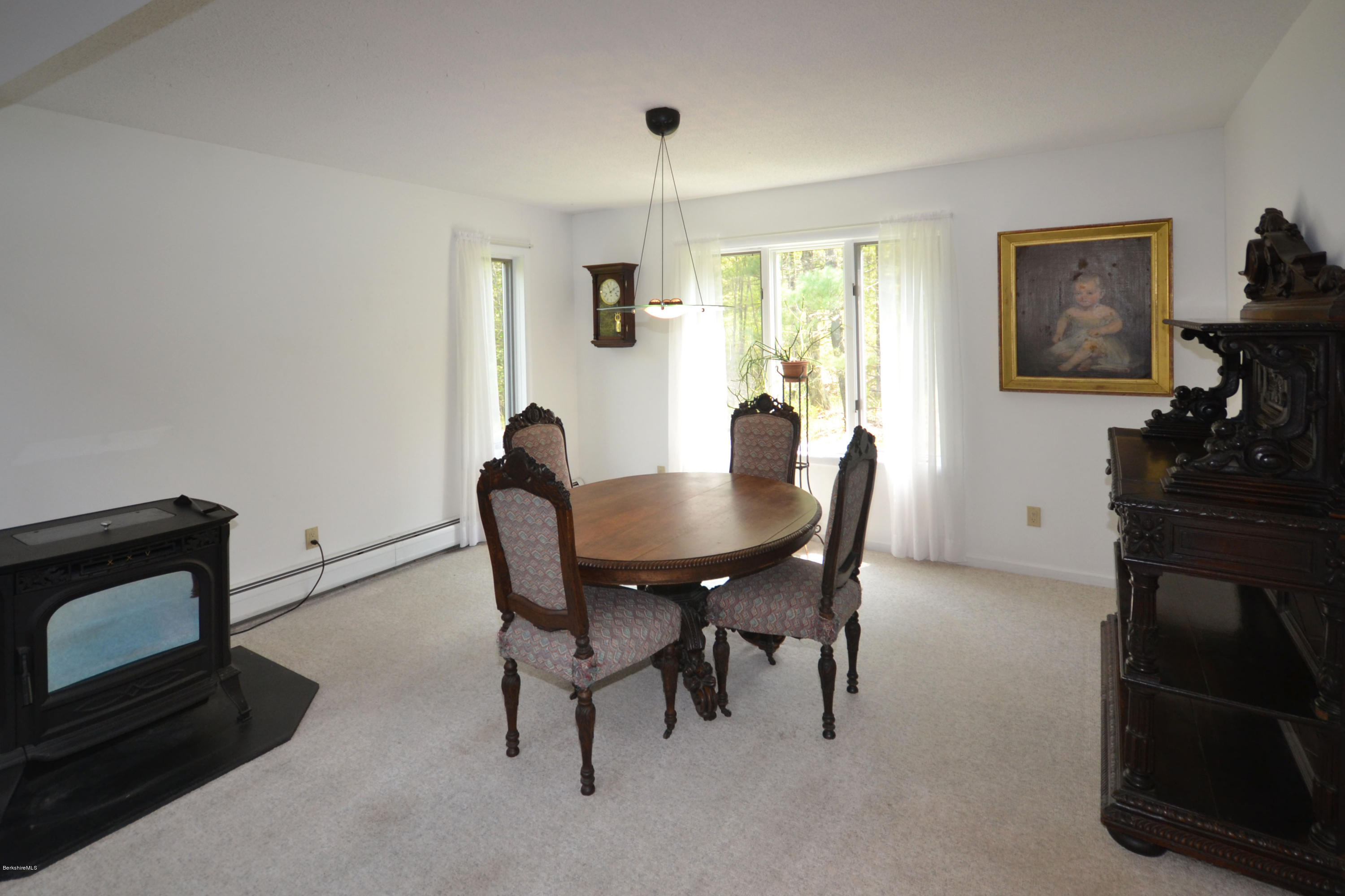 341 Pierce Road Windsor, MA 01270 - Photo 8 of 44 a view of a dining room with furniture and a window