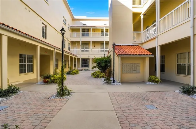 a view of a building with a door and a window