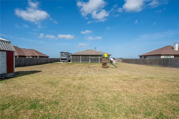 a view of backyard of house