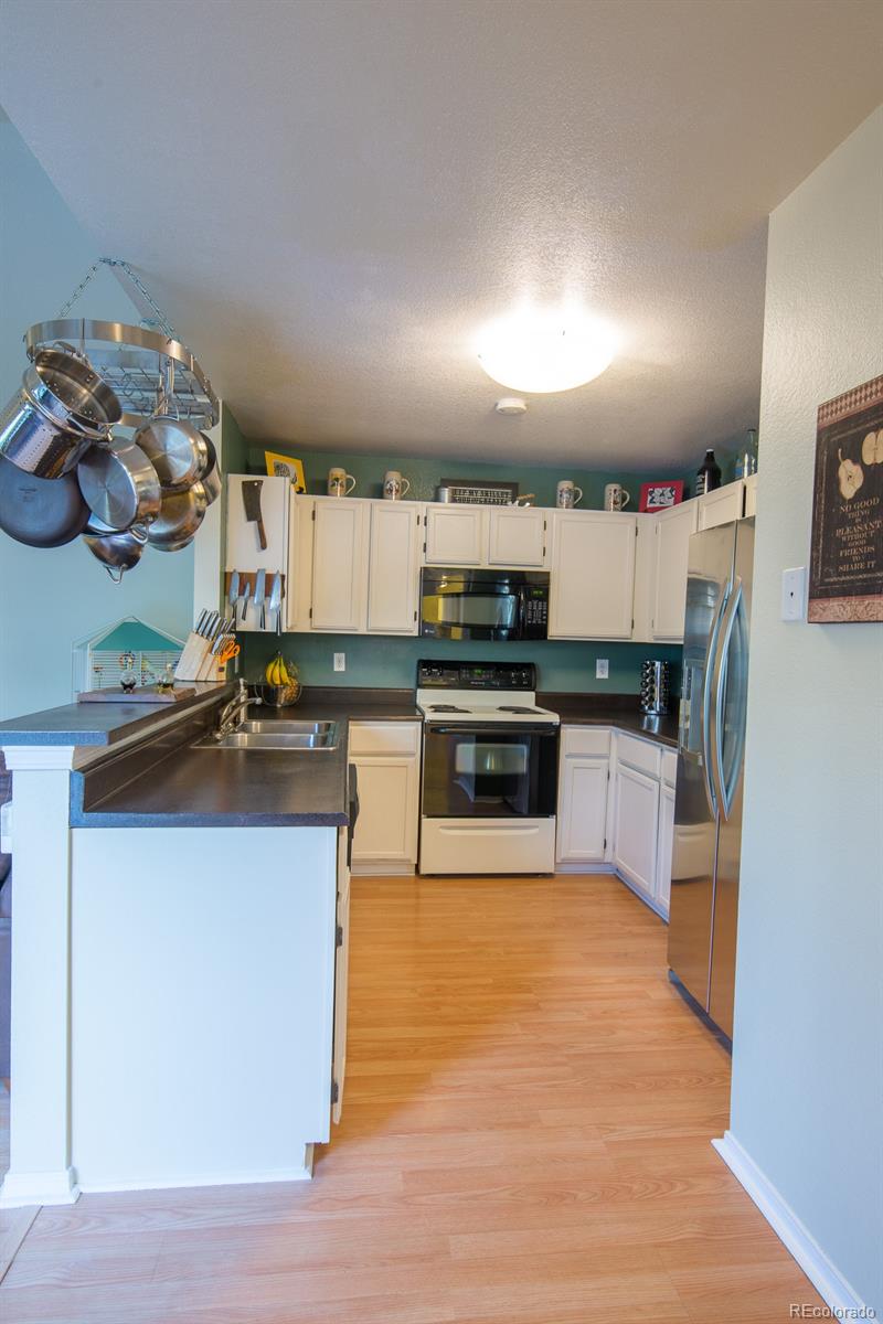 6834 Amherst Court Highlands Ranch, CO 80130 - Photo 8 of 30 Gallery Image 8