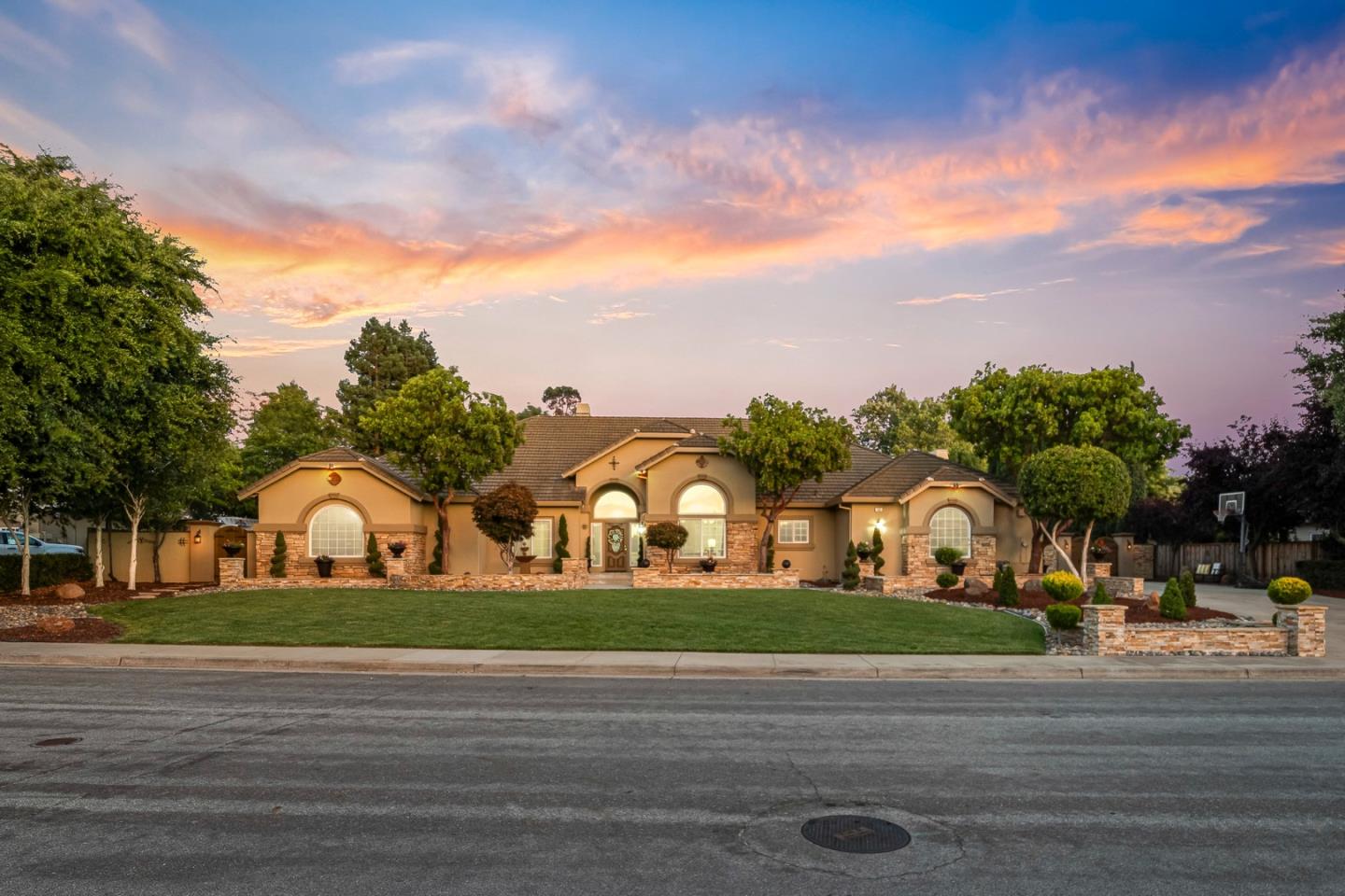 a view of a palm trees in front of a house