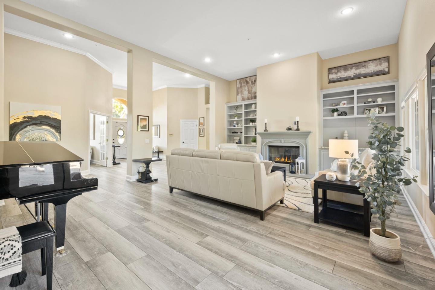 1980 Pear Drive Morgan Hill, CA 95037 - Photo 16 of 100 a living room with furniture a fireplace and a table