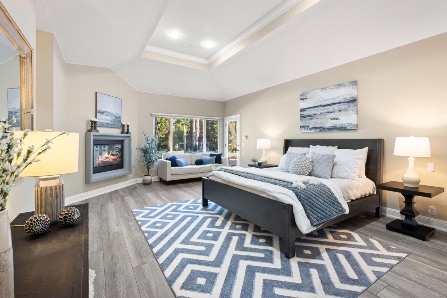 1980 Pear Drive Morgan Hill, CA 95037 - Photo 41 of 100 a bedroom with a bed and a fireplace