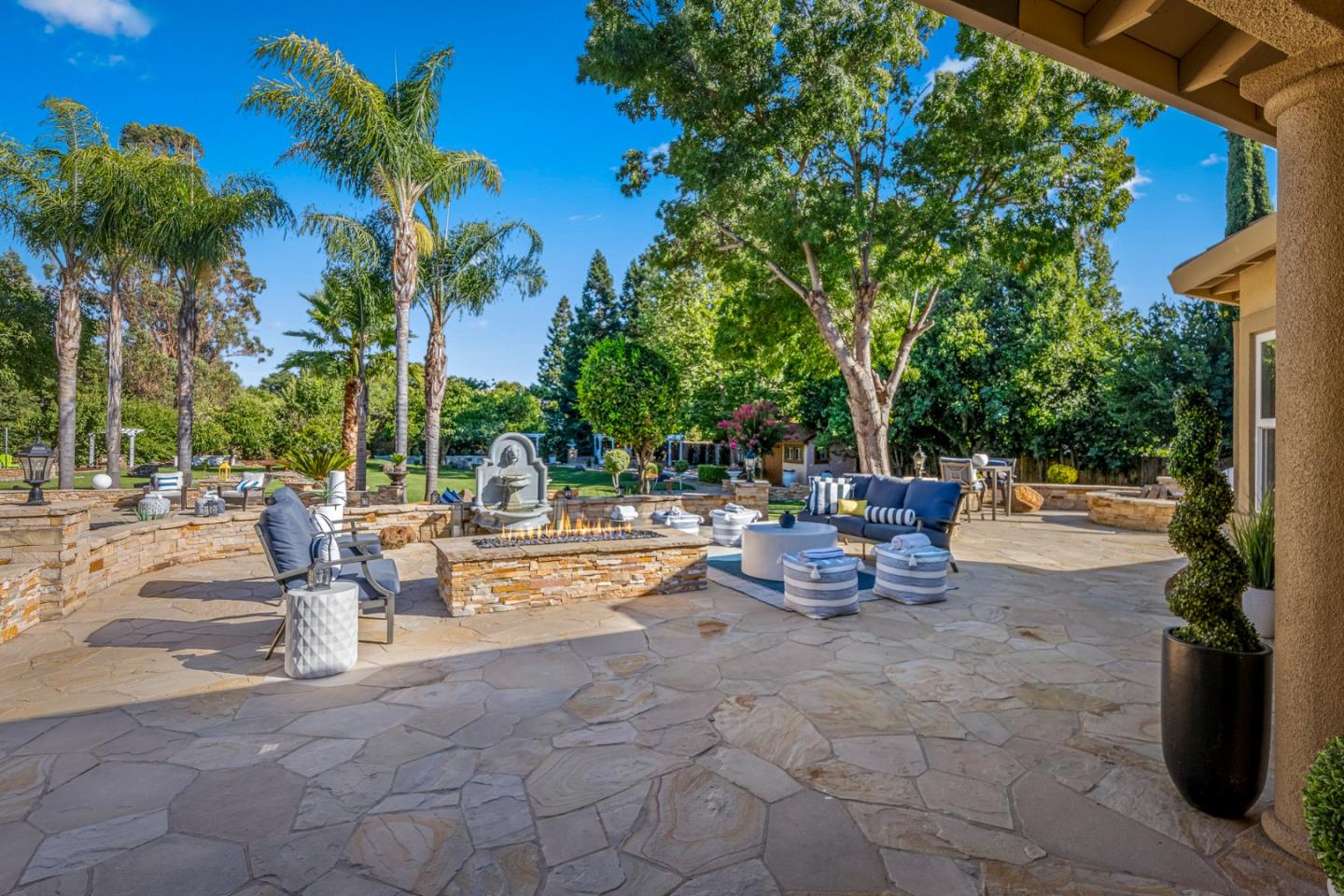 1980 Pear Drive Morgan Hill, CA 95037 - Photo 52 of 100 a view of the patio with a table and chairs under an umbrella