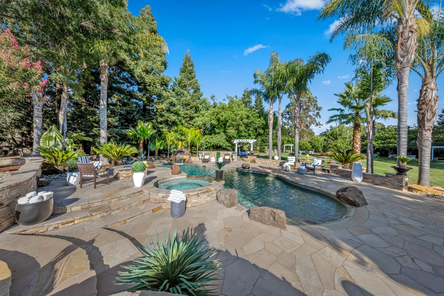 1980 Pear Drive Morgan Hill, CA 95037 - Photo 68 of 100 a view of swimming pool with outdoor seating and plants