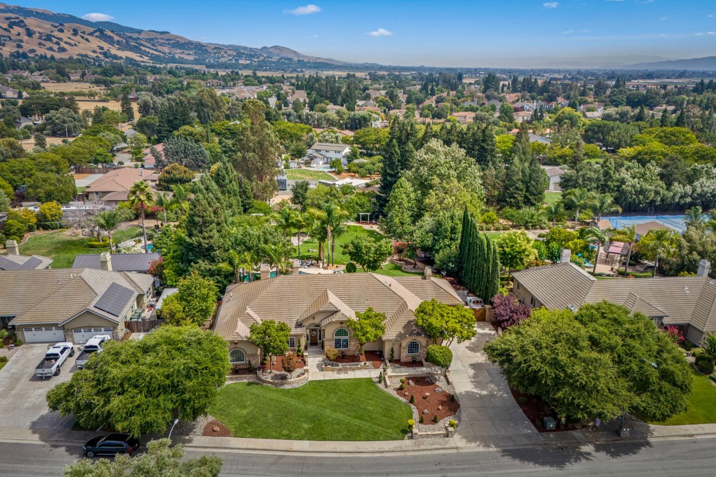 1980 Pear Drive Morgan Hill, CA 95037 - Photo 80 of 100 an aerial view of a house with a yard and lake view