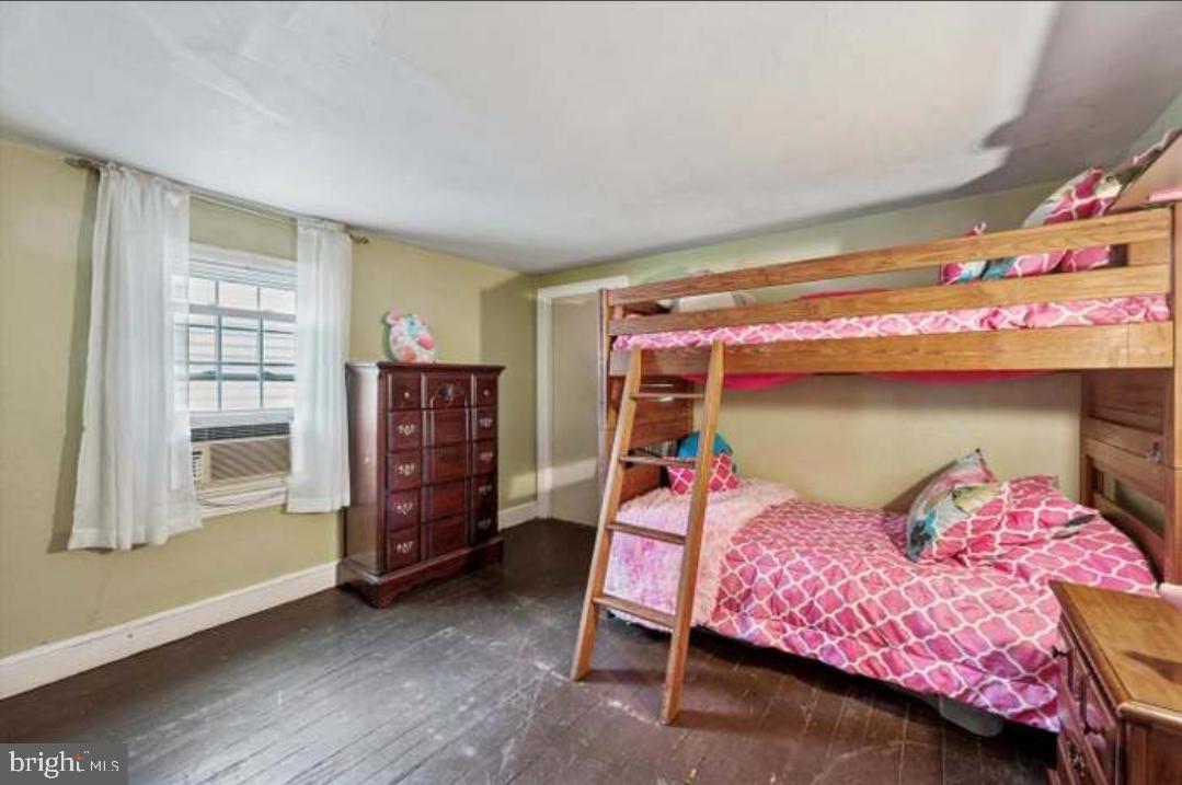 617 Manchester Avenue Media, PA 19063 - Photo 15 of 17 a bedroom with a bed and a window