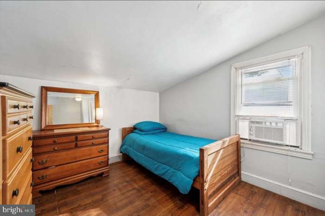 617 Manchester Avenue Media, PA 19063 - Photo 16 of 17 a bedroom with a bed and a window