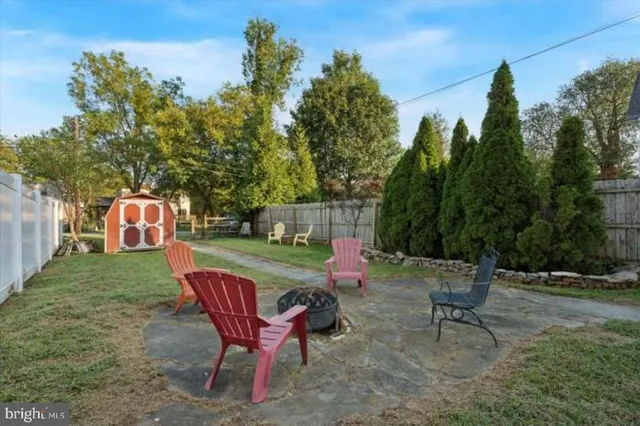 front view of a house with a tree