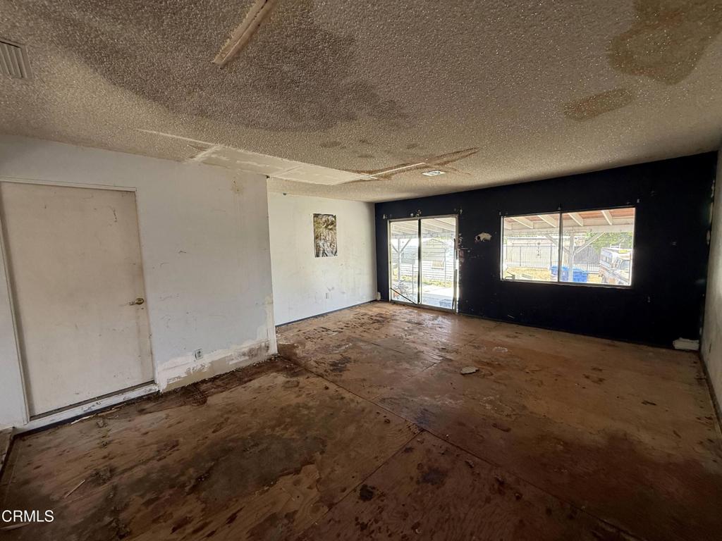 14306 Aztec Street Sylmar, CA 91342 - Photo 11 of 21 a view of an empty room with a window