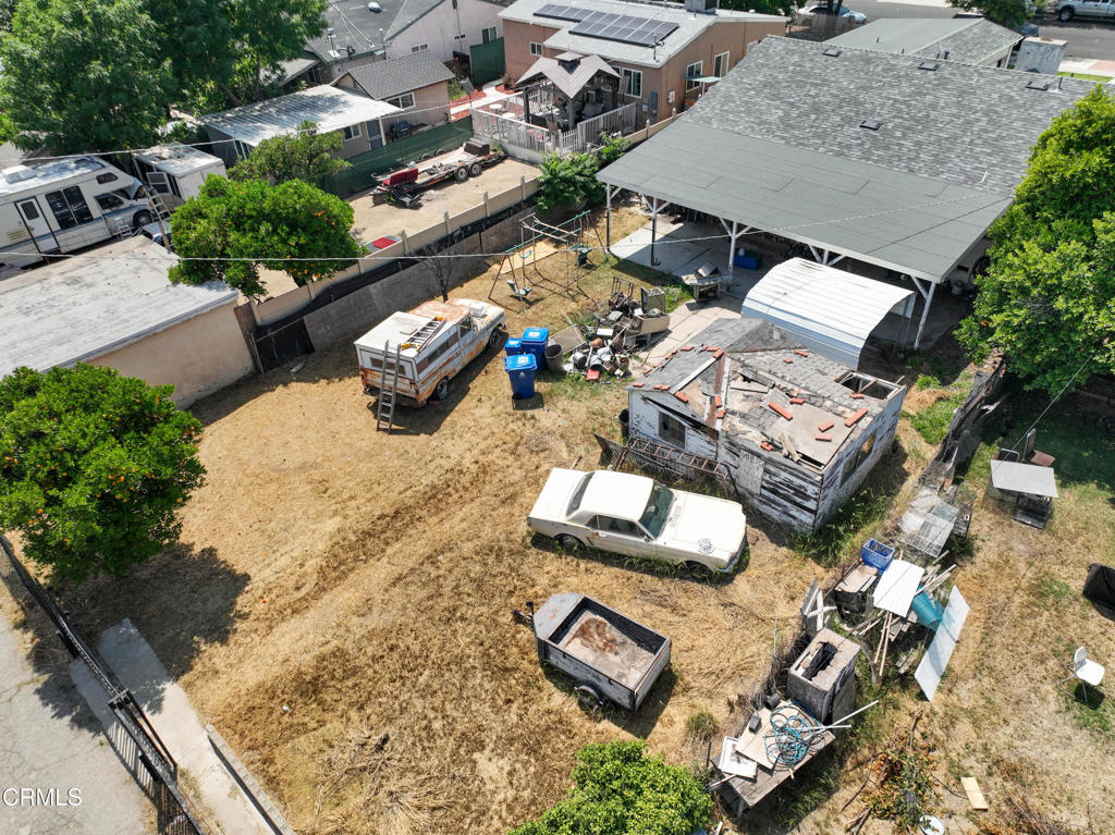 14306 Aztec Street Sylmar, CA 91342 - Photo 4 of 21 an aerial view of multiple houses with yard
