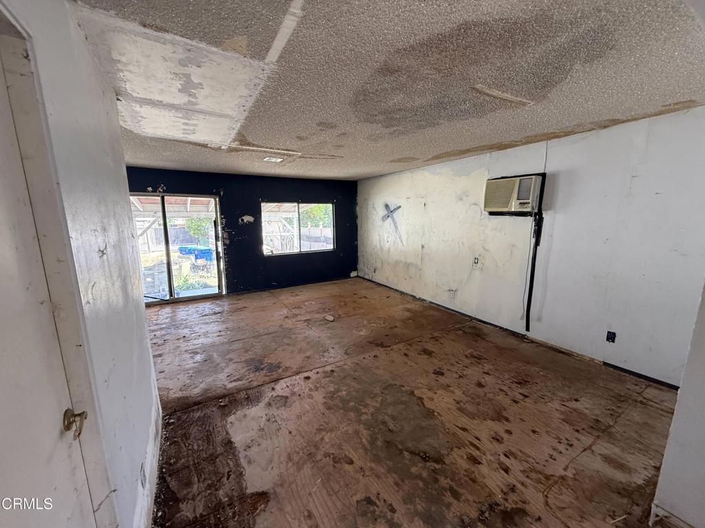 14306 Aztec Street Sylmar, CA 91342 - Photo 10 of 21 a view of livingroom with window