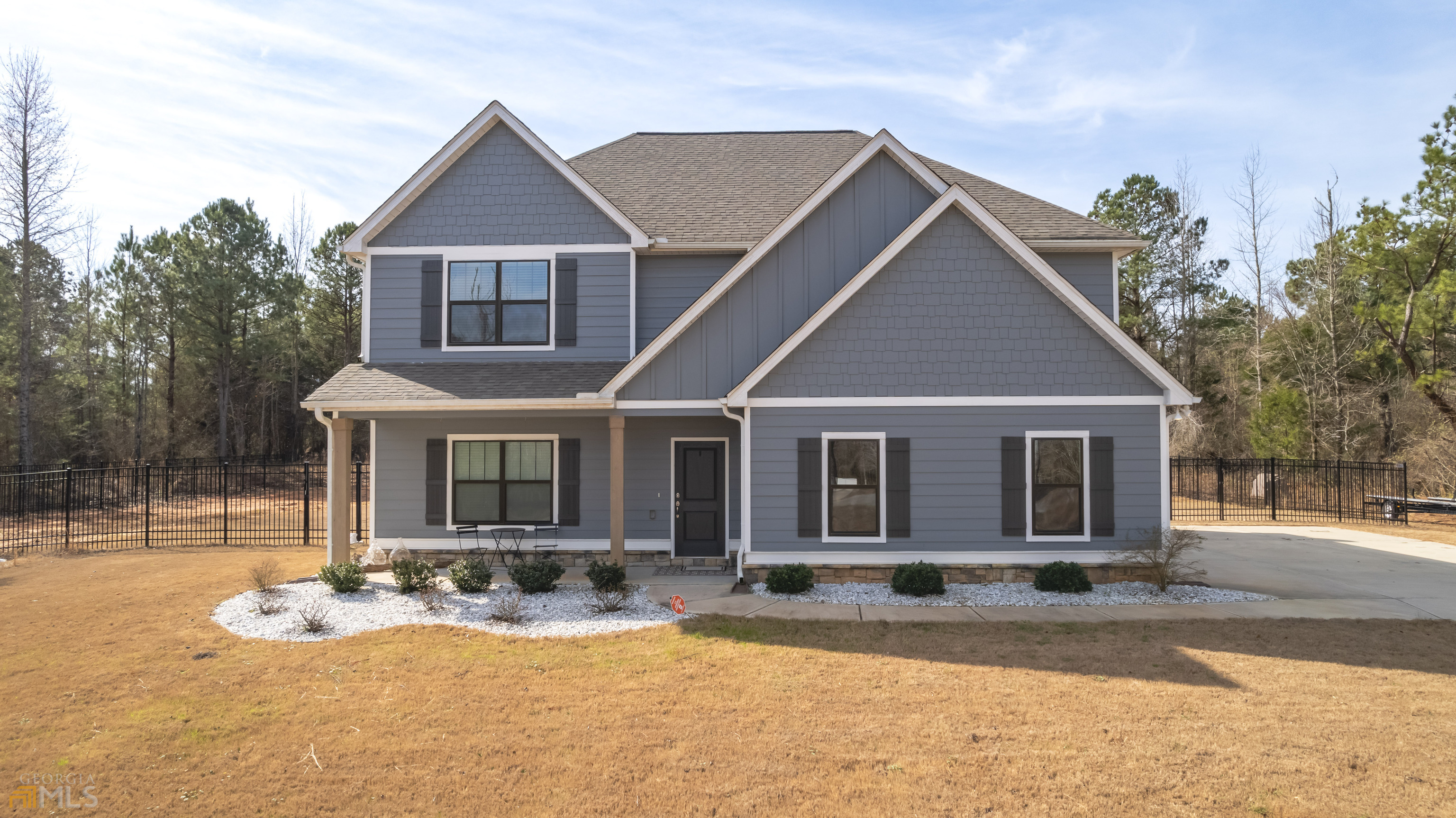 109 Robin Road Brooks, GA 30205 - Photo 1 of 1 a front view of a house with a yard