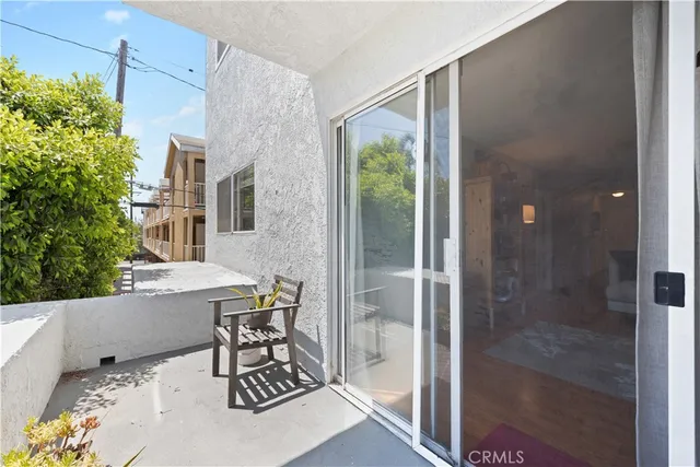 a kitchen with stainless steel appliances granite countertop a stove and a microwave
