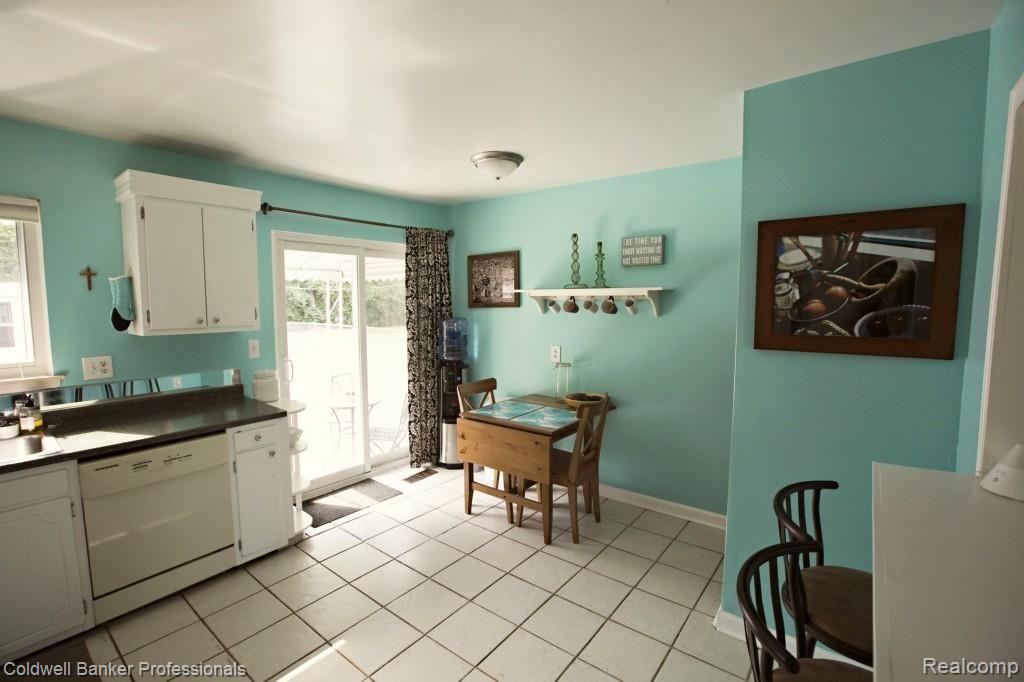4009 Kent Road Royal Oak, MI 48073 - Photo 21 of 41 Large Kitchen with Dining Area and Sliding Doors leading to Backyard