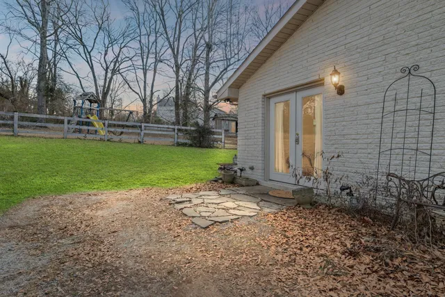 a view of backyard with green space