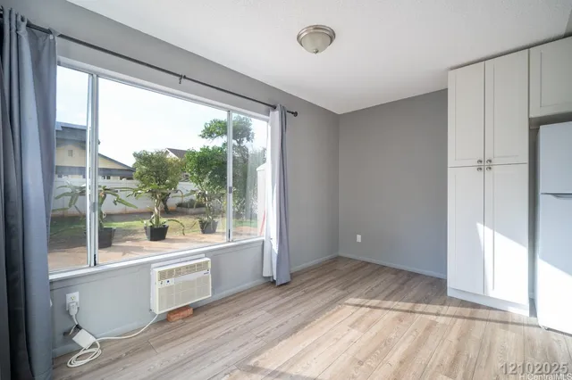 a view of a room with a large window