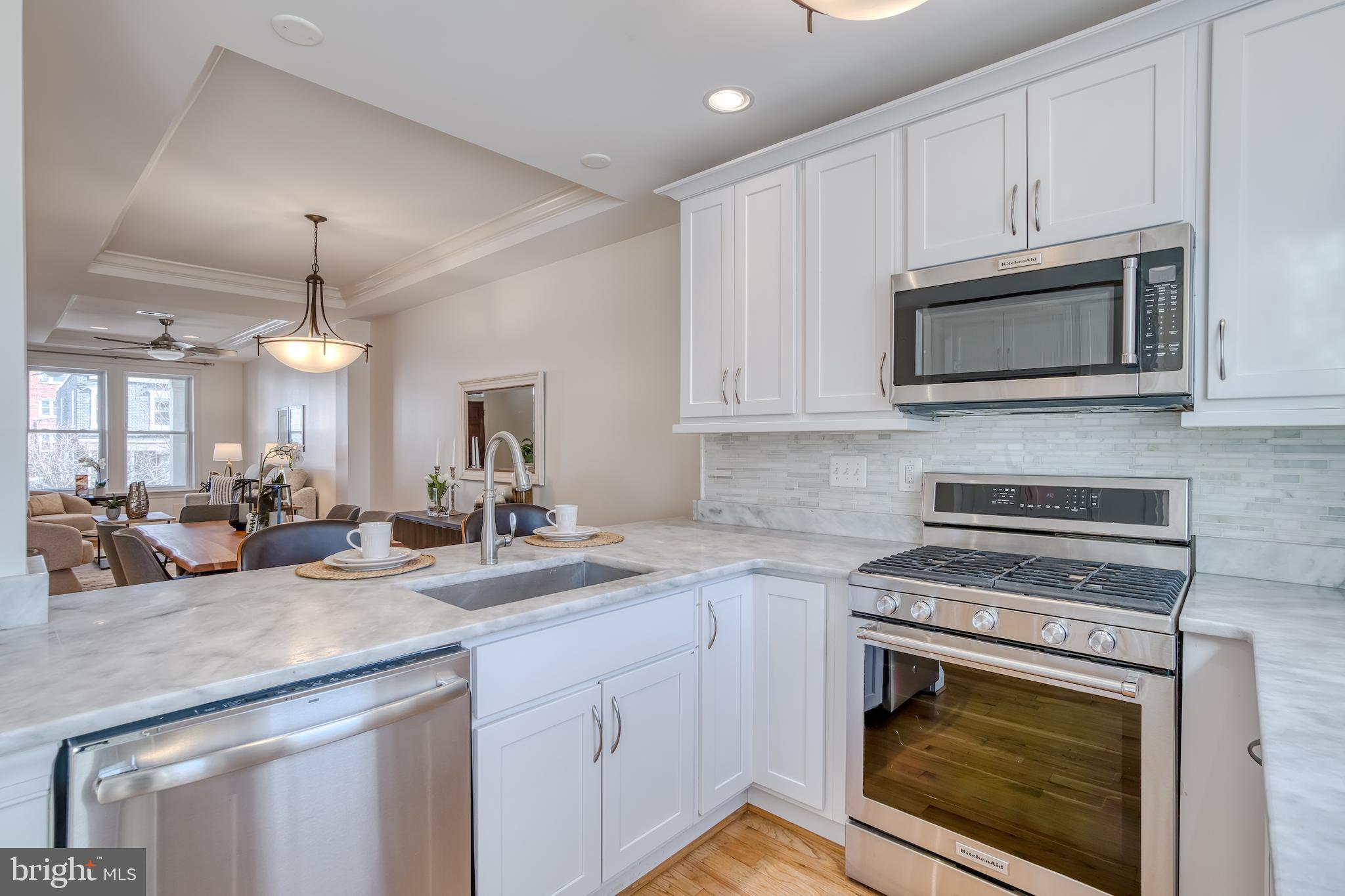 237 16th Street Southeast Washington, DC 20003 - Photo 14 of 47 Kitchen equipped with gas range...