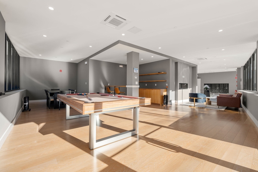 100 Lincoln Street, Unit 403 Boston, MA 02135 - Photo 21 of 23 a view of a living room and a livingroom