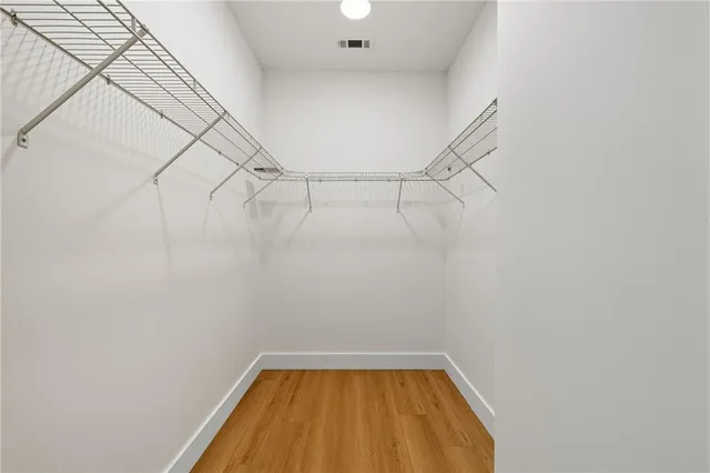 a view of a room with racks on the wall