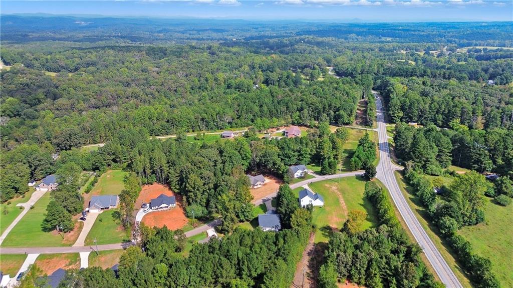 193 Tabitha Page Lane Toccoa, GA 30577 - Photo 30 of 33 an aerial view of residential house with outdoor space and swimming pool