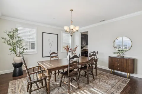a living room with furniture and windows