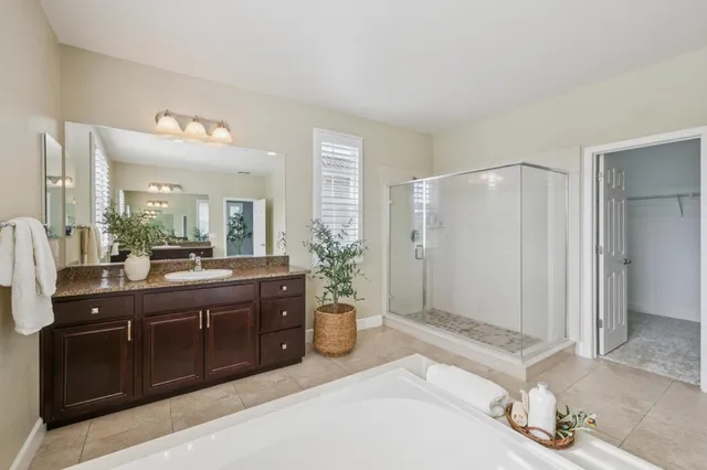 a view of a patio with couple of chairs