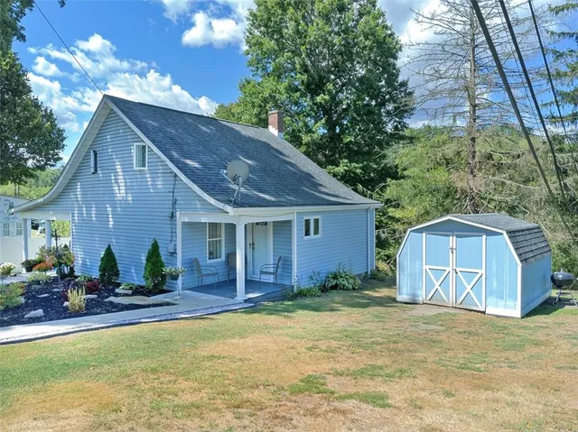 a house view with a outdoor space